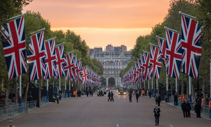 The day of Queen Elizabeth II ’s funeral. The sun rises over Buckingham Palace.
