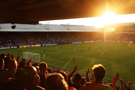 The sun sets over Selhurst Park during the opening game of the season between Crystal Palace and Arsenal