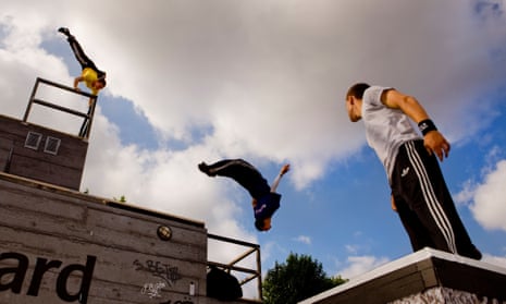 Parkour enthusiasts practice their moves.