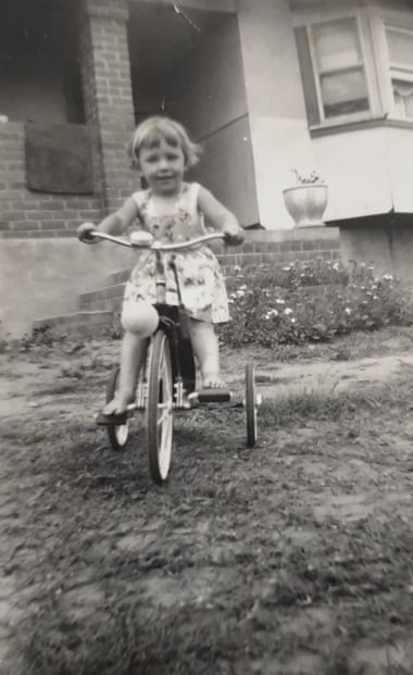 Writer Christine Sykes on her tricycle outside her family home in Cabramatta.