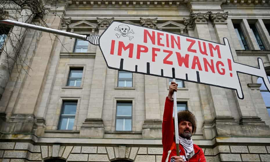 A protester opposed to mandatory vaccination outside  the German parliament in Berlin