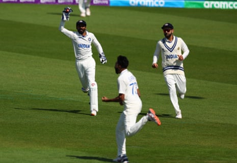 Srikar Bharat with the ball in his glove after catching out Travis Head.