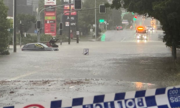 Australia Flood Evacuations: NSW, Queensland Under Threat After Ex-Tropical Cyclone Alfred Rescue being carried out on Monday on Newmarket Road in the Brisbane suburb of Windsor