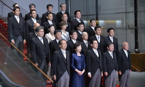 Japan’s prime minister, Fumio Kishida (front centre), poses with his cabinet in Tokyo