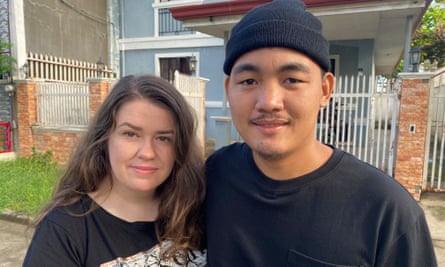 Sarah and Jgoy in front of his house in Philippines in dating series The Nevermets.