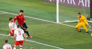 Spain’s Alvaro Morata scores their first goal.