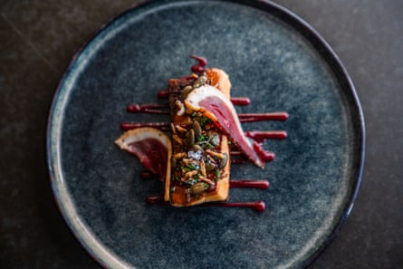 classy looking bacon dish on grey plate