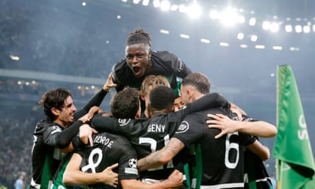 Viktor Gyökeres (centre) celebrates with teammates after his hat-trick helped Sporting to a 4-1 success against Manchester City.