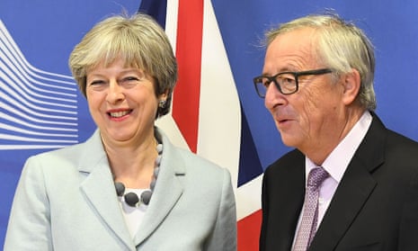 Theresa May is welcomed by European commission president Jean-Claude Juncker in Brussels.
