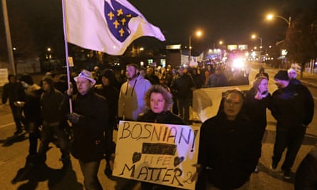 Bosnians march along Gravois Road in 2014 to protest the murder of Zemir Begic in St Louis.