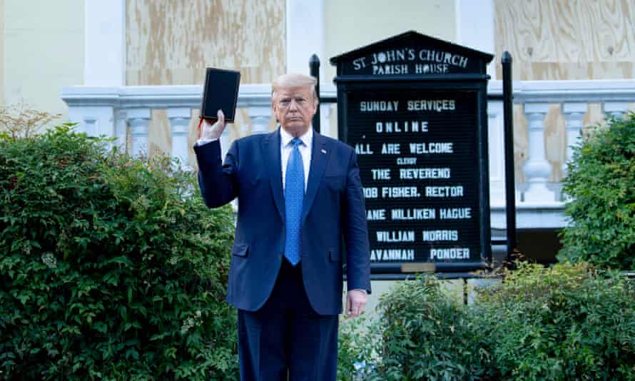 Donald Trump holds a Bible while visiting St. John’s Church across from the White House after the area was cleared of protesters on Monday.