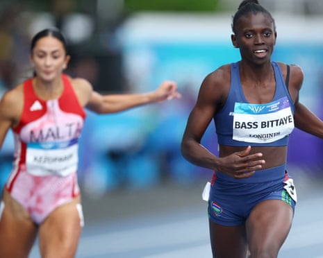 Gambia's Gina Mariam Bass Bittaye and Malta's Claire Azzopardi in action during the women's 100m.
