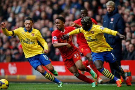 Sagna attempts to stop Liverpool’s Raheem Stirling at Anfield in February 2014.