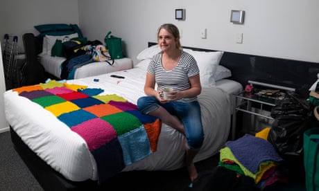‘Urgent’ national housing summit needed, Queensland industry groups and charities say? 1 Joanne Moody sitting in a motel room