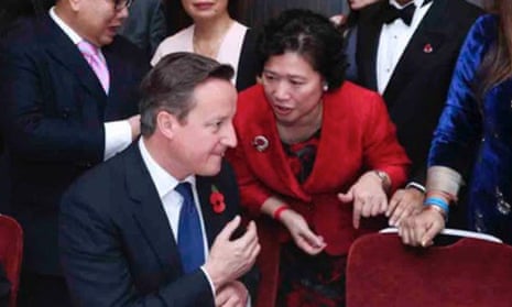 Christine Lee and David Cameron at the ceremony of the British GG2 leadership awards in 2015.