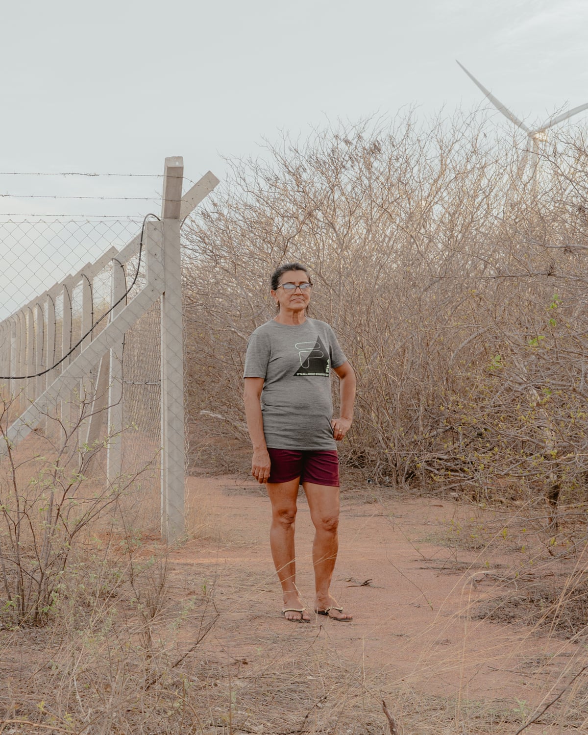 Relvani de Brito stands near her land in Serra do Mel.