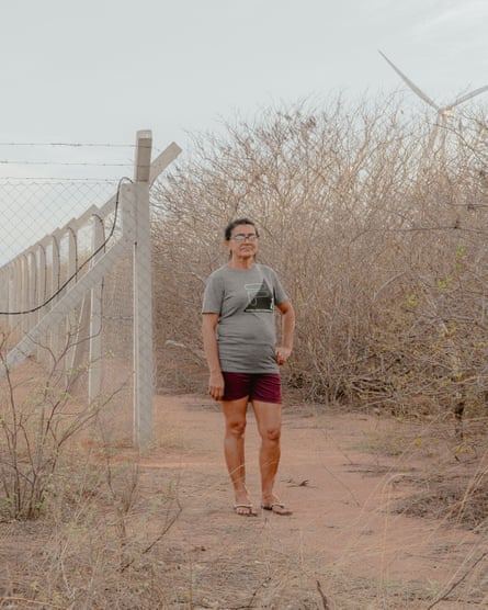 Relvani de Brito stands near her land in Serra do Mel.