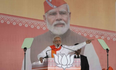 Indian prime minister Narendra Modi addresses a BJP rally in Mehsana, Gujarat, before state assembly elections begin on 1 December.