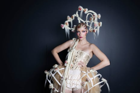 Woman with hair plaited and styled into an elaborate headdress