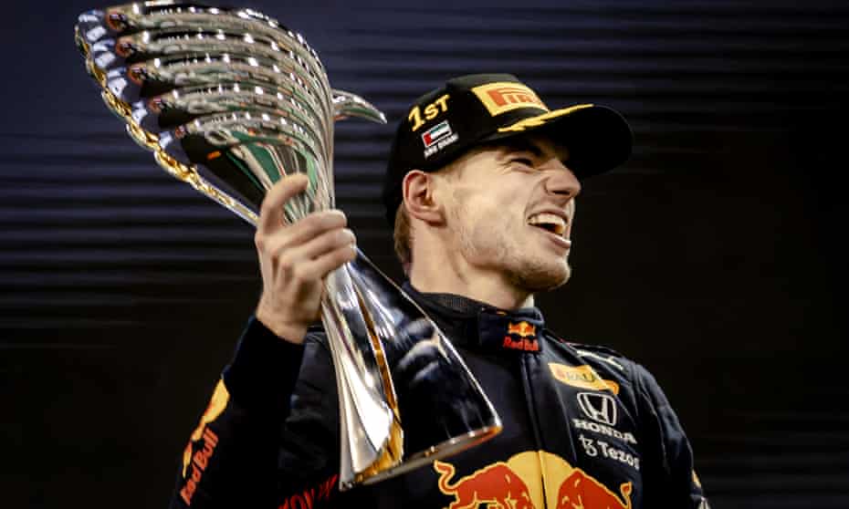 Max Verstappen celebrates winning the Formula One world championship following a controversial finish at the Abu Dhabi Grand Prix.