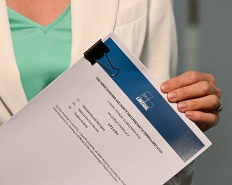 Australian Housing Minister Clare O’Neil holds a copy of the Liberal Party review.