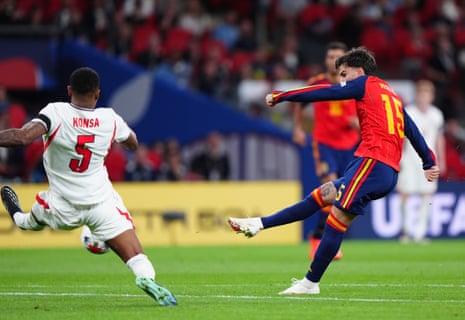 Spain's Alex Baena scores their side's second goal to level the scores.