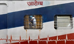 Coronavirus live news: Tokyo has 1,359 new cases on first day of Olympics; Malaysia reports record daily cases 6 Railway workers being vaccinated on a train in Kolkata yesterday.
