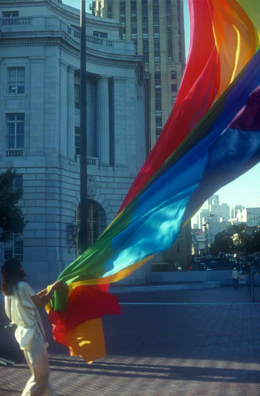 Volunteers hoist one of the two original rainbow flags in 1978. A segment from this flag was donated in April to the GLBT Historical Society’s museum in San Francisco.