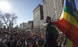William Rosen looks over protesters as they participate in the Women’s March on January 21, 2017 in Chicago, Illinois.