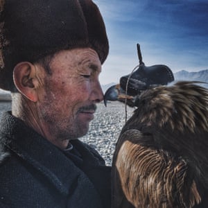 Grand prize winner and Photographer of the Year went to Siyuan Niu of China for his shot of a man and eagle