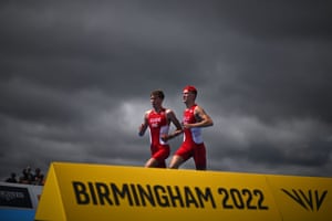 England’s Oscar Kelly and his guide Charlie Harding compete in the men’s PTVI Triathlon.