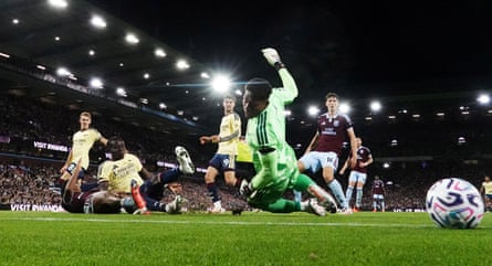 Bukayo Saka scores from close range for Arsenal against Aston Villa
