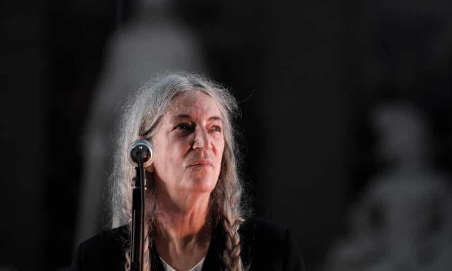 ‘I try to permeate some good through my work’ … Patti Smith, during a performance in Paris in October 2021.