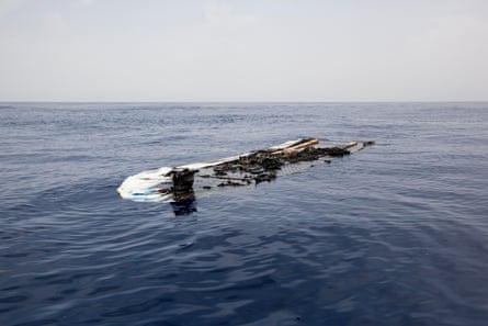 Libyan Sea, June 2016. The remnants of a rubber boat are pictured floating in the Mediterranean Sea after having been set ablaze by an unidentified source.