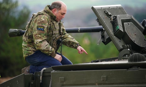 Ben Wallace is given a demonstration of an Ajax Ares armoured fighting vehicle at Bovington Camp.