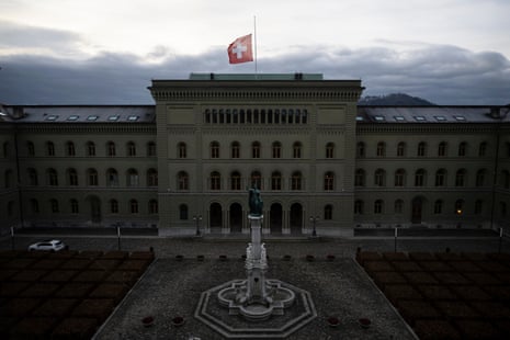 The flags at the federal palace flying at half-mast in Berne.