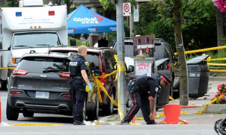 Toronto police at the scene of Sunday’s shooting.