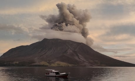 Indonesia volcano: thousands evacuated amid spreading ash and tsunami fears