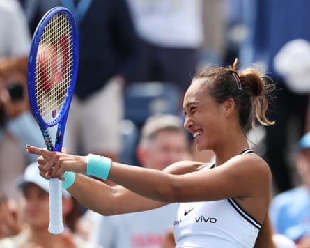 Zheng Qinwen gestures to the crowd after her win