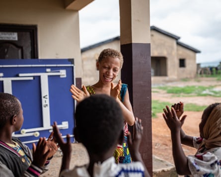 Gloria, 11, playing with other children at Vine Heritage Home.
