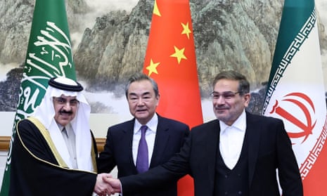 Wang Yi, a Chinese senior diplomat, with Musaad bin Mohammed Al Aiban, Saudi Arabia’s national security adviser, and Ali Shamkhani, the secretary of the Supreme National Security Council of Iran.