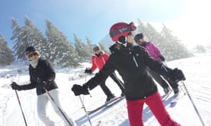 Four women on ski slope Four women on ski slope