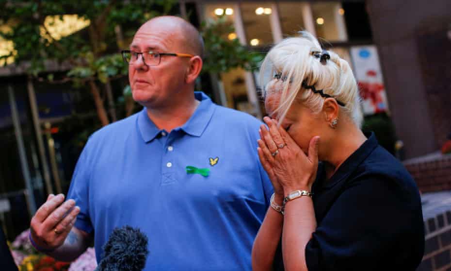 FILE PHOTO: Tim Dunn and Charlotte Charles, parents of British teen Harry Dunn who was killed in a car crash on his motorcycle, allegedly by the wife of an American diplomat, speak during a interview in the Manhattan borough of New York City, New York, U.S., October 15, 2019. REUTERS/Eduardo Munoz/File Photo