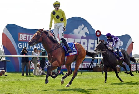 Billy Loughnane celebrates after winning the 2,000 Guineas on Bow Echo.