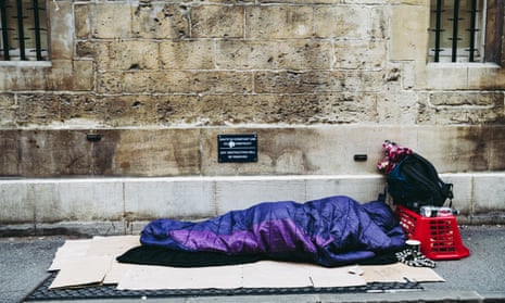 Homeless person sleeping on the street