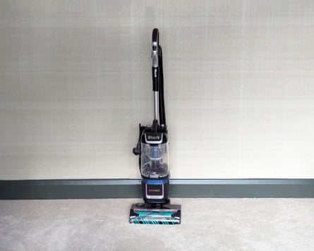 Shark Detect Lift-Away XL LA791UKT Upright Bagless Vacuum Cleaner photographed on grey living room carpet against a white/grey wall.