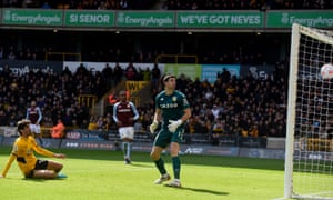Villa’s Emiliano Martinez reacts as Ashley Young scores an own goal and Wolverhampton Wanderers’ second.