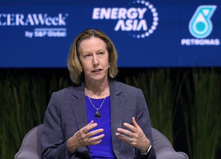 Meg O’Neill speaks at a conference.
