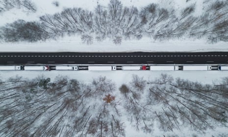 Trucks line up to cross the Polish-Ukrainian border at the Dorohusk-Jagodzin crossing, in Ludwinow, Poland, on 4 December 2023.