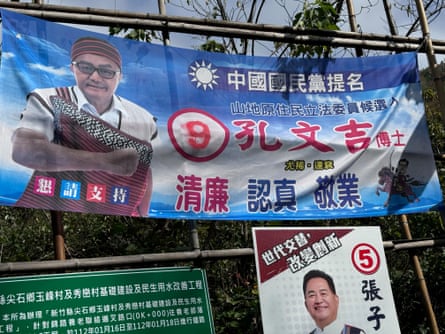 Campaign posters line the winding road up to Smangus, a remote Indigenous village in Taiwan.